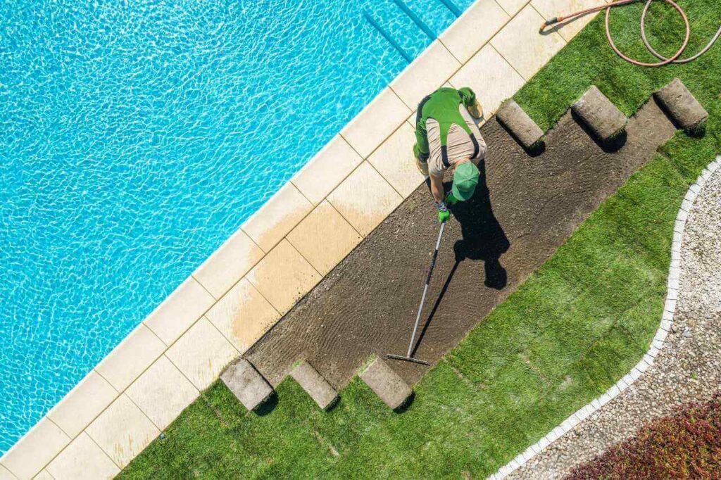 turf installation around plunge pool landscaping